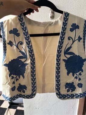 Embroidered Cream Sleeveless Vest with Blue Floral Detail